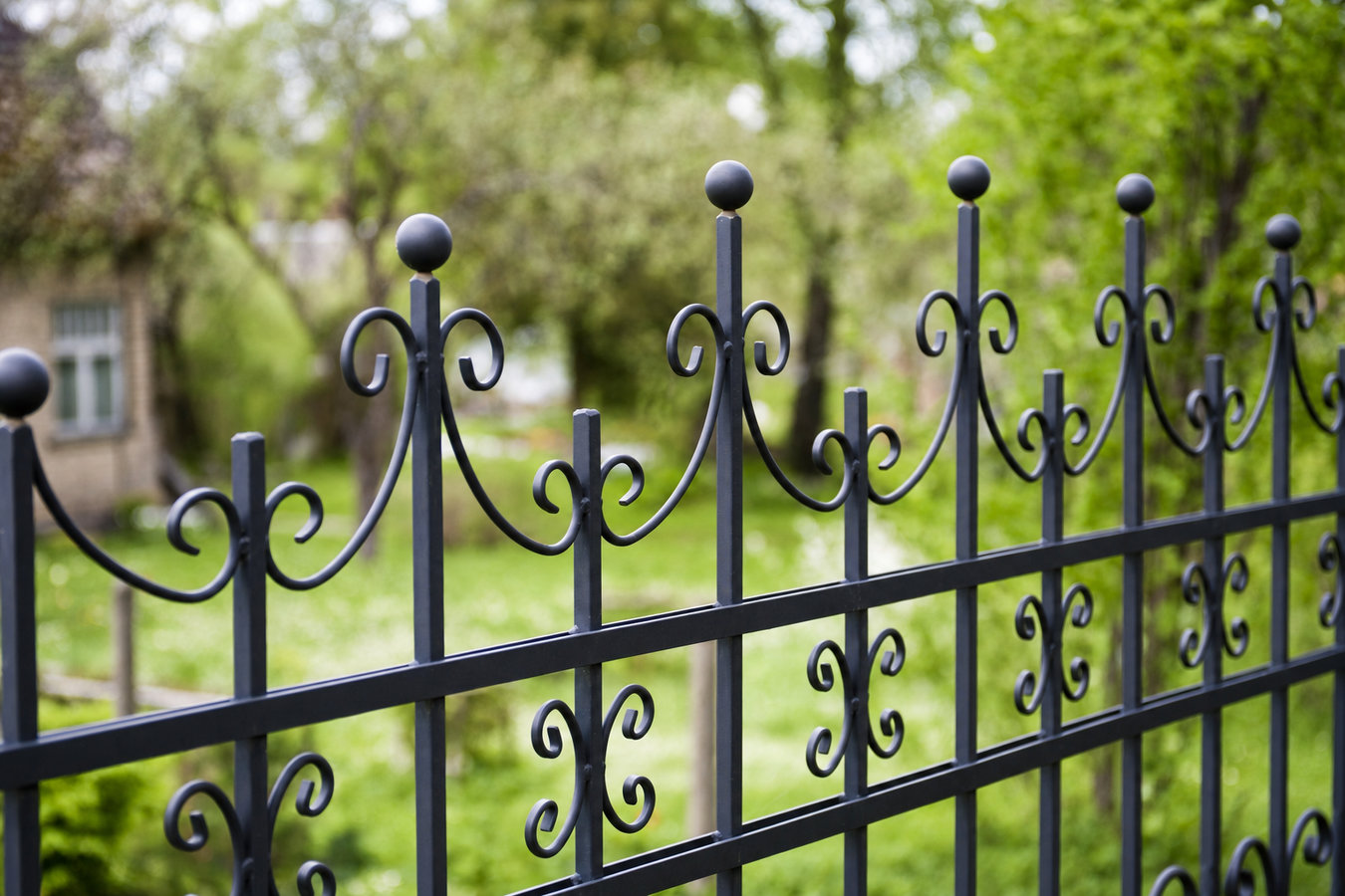 Ornamental iron fence installation